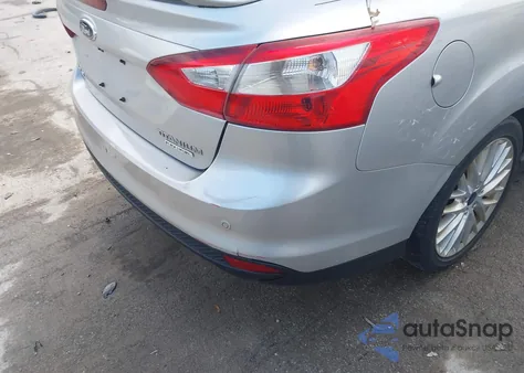 2014 Ford Focus Titanium из США, поврежденный, VIN 1FADP3J26EL404933